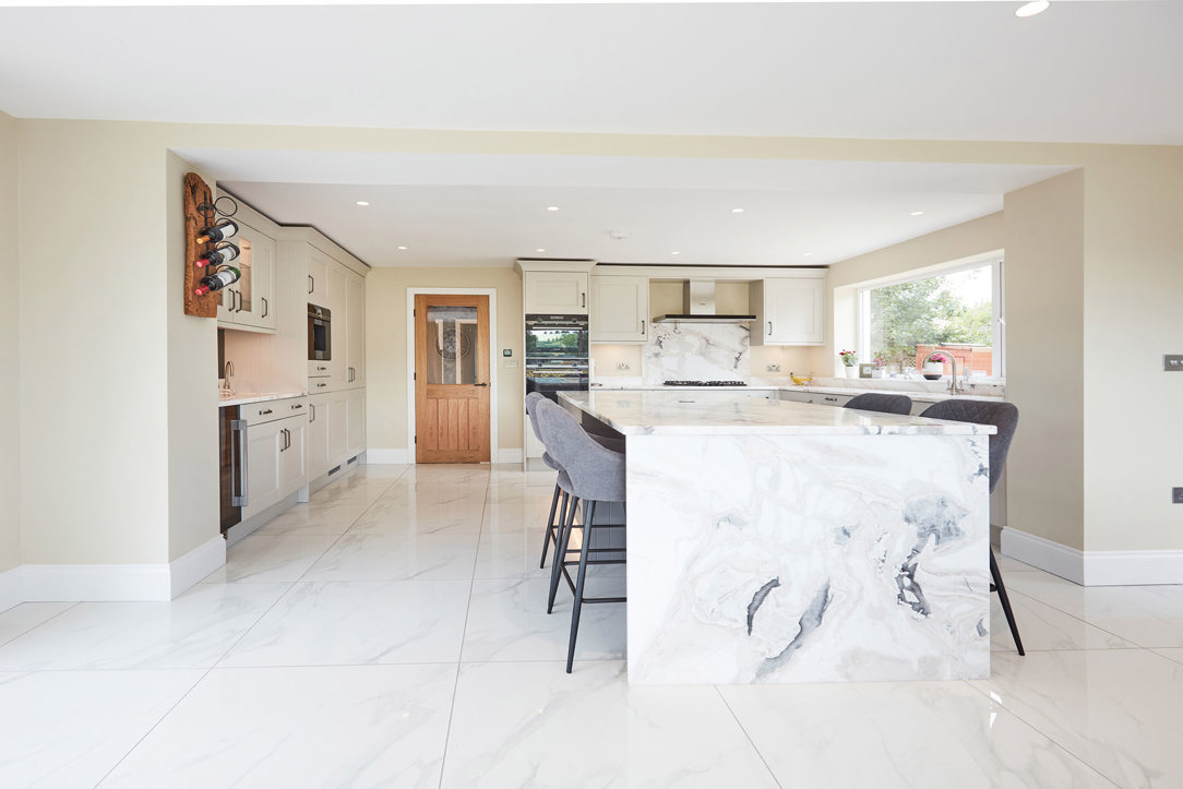 Quartz kitchen island with waterfall edge