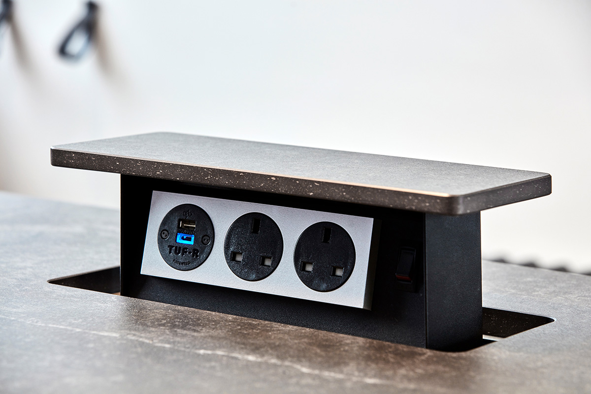 Concealed pop-up socket in kitchen island