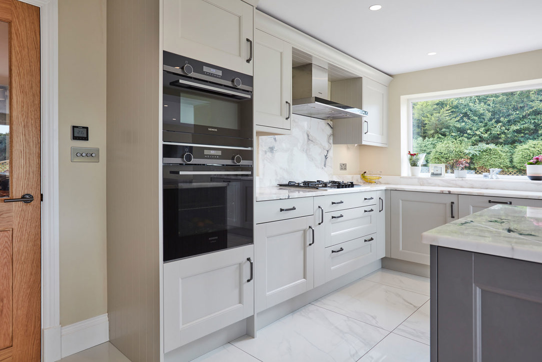 Grey and cream shaker kitchen with Siemens appliances